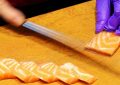 Rêver de découper du poisson cru : 8 Significations et Symbolismes